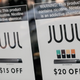 An advertisement for Juul’s e-cigarette pods, including those flavored.